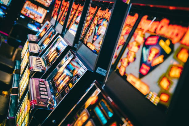 Live Colok Jitu dealer at koi77 login studio with cards and dice visible on HD camera